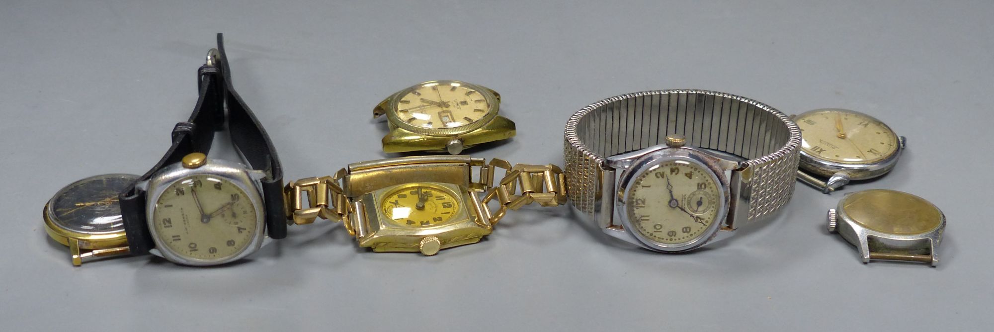 Seven assorted wrist watches including J.W. Benson, Bucherer, Dulux and Tissot.